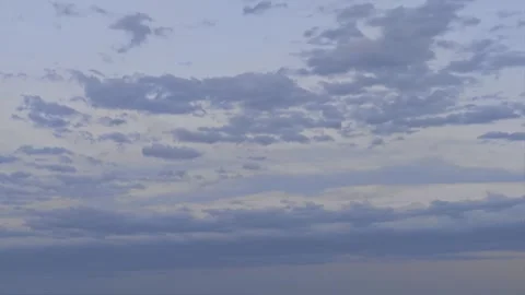 Grey stratocumulus clouds moving in the sky Video stock 344907973