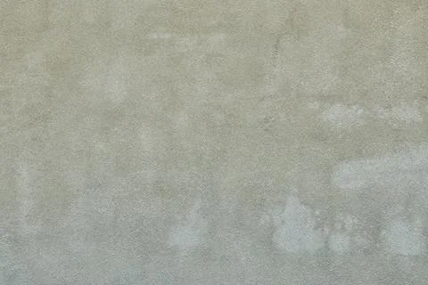 Grey stucco wall background. Textured concrete surface. Old cement plaster .. Stock Photos