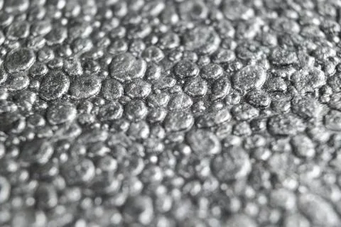 Grey styrofoam background texture closeup. Macro shot  texture of grey polyst Stock Photos
