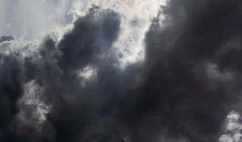 Grey summer storm clouds background. Zenith view from ground surface. Foto stock
