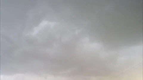 Grey sunset clouds in the sky timelapse Stock Footage 82047845