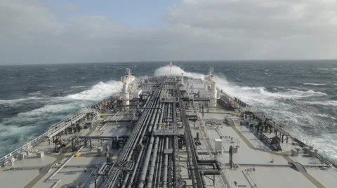 Grey tanker is proceeding through the rough sea. Stock Footage 62792026