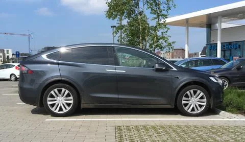 Grey Tesla model X. Stock Photos