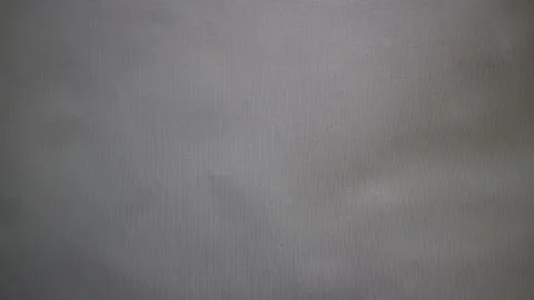 Grey textile fabric texture forms a neutral, subtle background, serving des.. Stock Photos