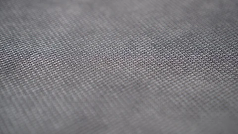 Grey textured fabric extremely close up Stock Footage 98625708
