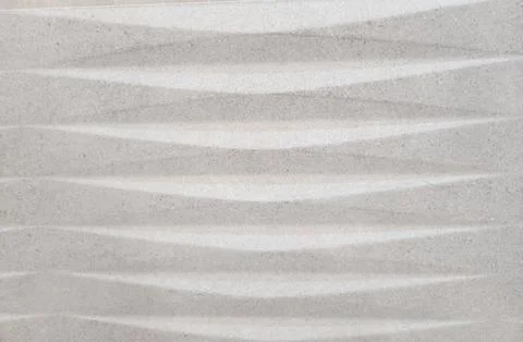 Grey textured geometric wall pattern Stock Photos