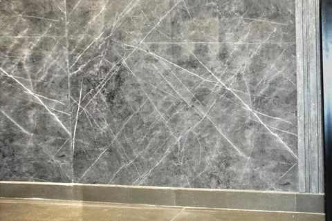 Grey textured marble wall background closeup interior exterior tiles design Stock Photos