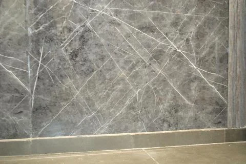 Grey textured marble wall background closeup interior exterior tiles design Stock Photos