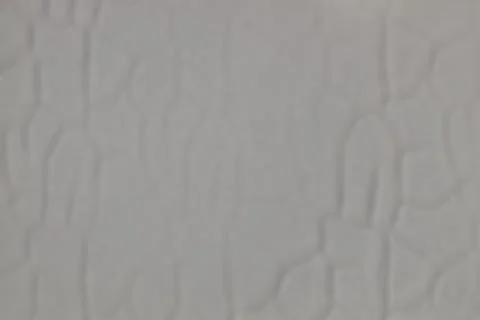 Grey Textured Wall Background with mostly vertical lines and subtle shadows Stock Photos