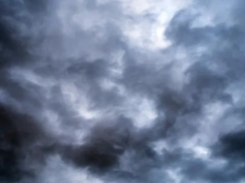 Grey tragic cloudscape with chaotic dark clouds Foto stock