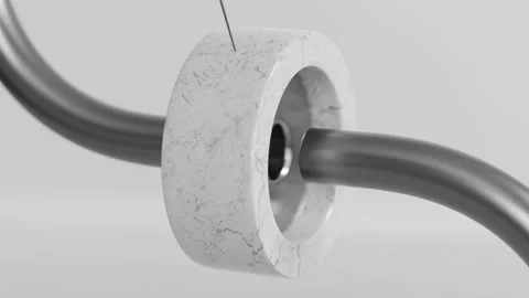 A grey tube and a ring on a string in a satisfying 3d animation Stock Footage 253595874