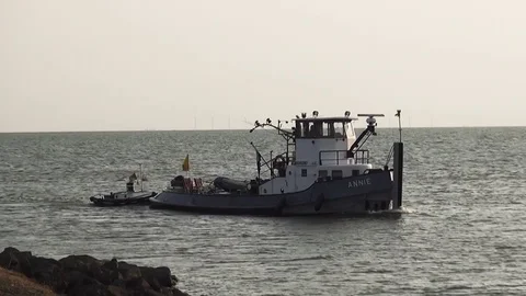 Grey tug comming into the port. Stock Footage 95437257