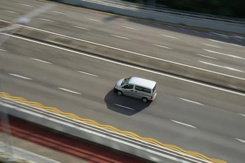 Grey van on highway. Stock Photos
