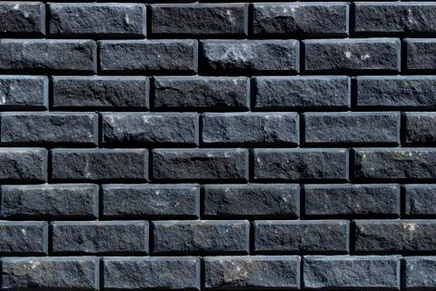 Grey wall as background, texture of a grey brick wall Stock Photos