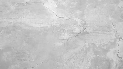 A grey wall with a grey background. The wall is made of concrete and has a ro Foto stock