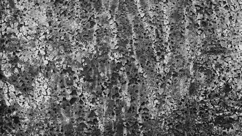 Grey wall made of marble aggregate with small crumbs, close up view. Stock Photos