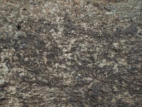 Grey wall made of marble aggregate with small crumbs, close up view. Stock Photos