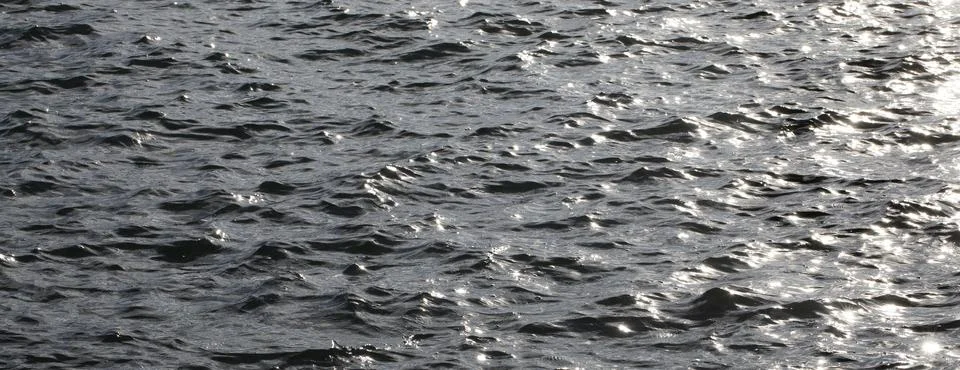 Grey water surface with small waves, Abstract background, Graphic elements, Stock Photos