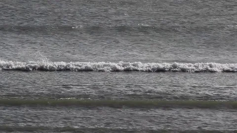 Grey waves rolling in : sea only Stock Footage 73337832