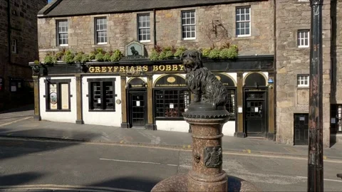 Greyfriars Bobby Monument with pub in background Edinburgh Scotland UK Stock Footage 131735070