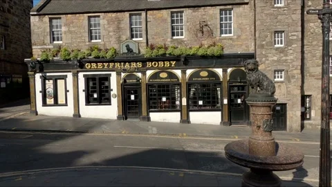 Greyfriars Bobby Monument with pub in background, Edinburgh Scotland UK Stock Footage 131735152