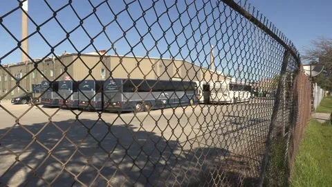 Greyhound Canada coach buses sit parked after going out of business in recession 스톡 동영상 154080128