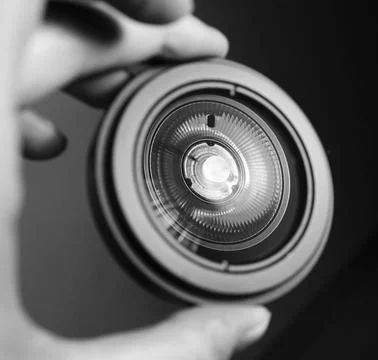 Greyscale close up of a camera lens Stock Photos