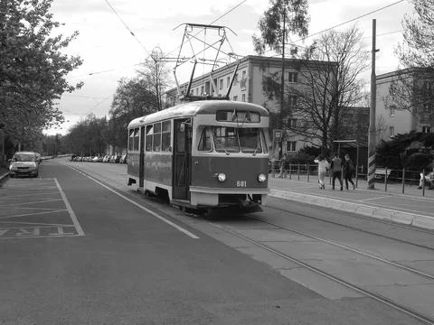 Greyscaled image - Old red communistic tram on exhibition tour through Ostrava. Stock Photos