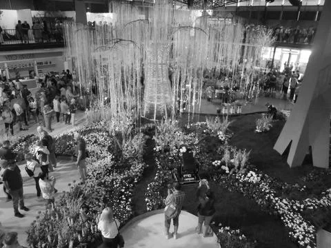 Greyscaled image - Overall view of Flora Exposition hall with multicolored Stock Photos