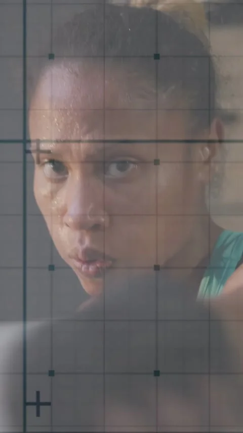 Grid aligning, boxer throwing fast punches at camera, breathing hard, sweating Stock Footage 331050225