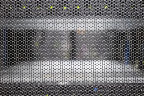 Grid background in the server room with wires from computers and network equi 스톡 사진