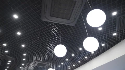 Grid ceiling decorated with glowing spheric lights Stock Footage 318742675