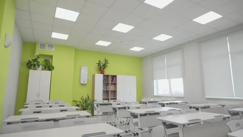 Grid ceiling with square LED panels fills empty room Stock Footage 335644015