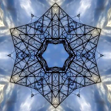 Grid of electrical towers in a star pattern Stock Photos