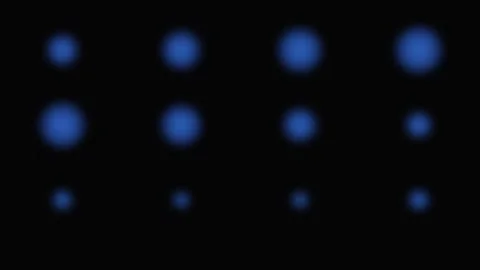 A grid of glowing blue circular orbs set against a deep black background Stock-Footage 339617087