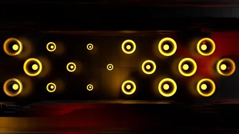 Grid of Glowing Yellow Speaker Rings Sliding Across Dark Wall Stock Footage 346780770
