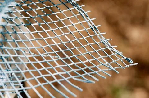 Grid of grids in selective focus on a brown background Stock Photos