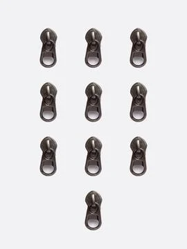 Grid of gunmetal zipper pull sliders Stock Photos