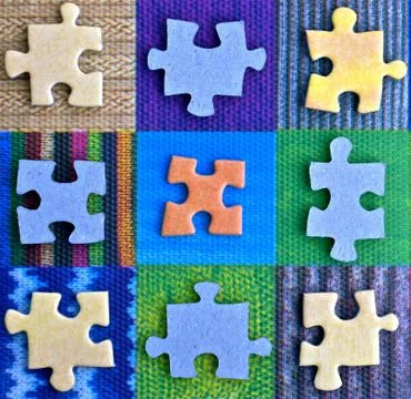 A grid of jigsaw pieces. Stock Photos