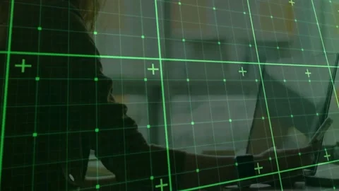 Grid overlay scanning office worker typing, glancing at laptop screen in Stock Footage 330584317