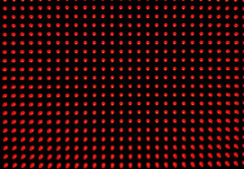 A grid pattern of red light emitting diodes (LEDs) arranged Stock Photos