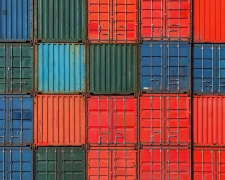 Grid pattern of stacked freight containers Stock Photos