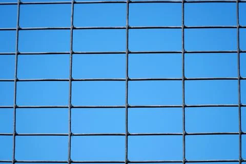 Grid with a rectangular cell on blue sky background 스톡 사진