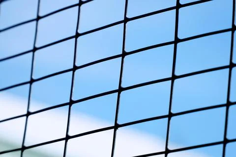 Grid with a rectangular cell on blue sky background 스톡 사진