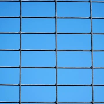 Grid with a rectangular cell on blue sky background Stock-Fotos