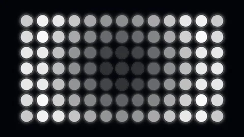 Grid of round light bulbs flashing in radial wave pattern Stock Footage 341844596
