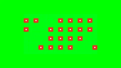 A grid of small red squares with white centers on a vibrant green background Video stock 341839697