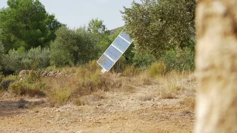Off grid solar panel in a rustic land. Green nature Stock Footage 145971973