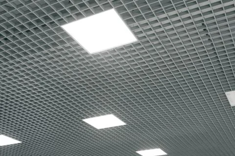Grid structure of suspended ceiling. Contemporary interior design. Stock Photos