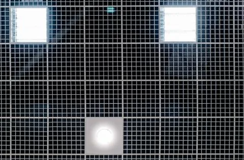 Grid structure of suspended ceiling in an mall building. Abstract modern arch Fotos de archivo